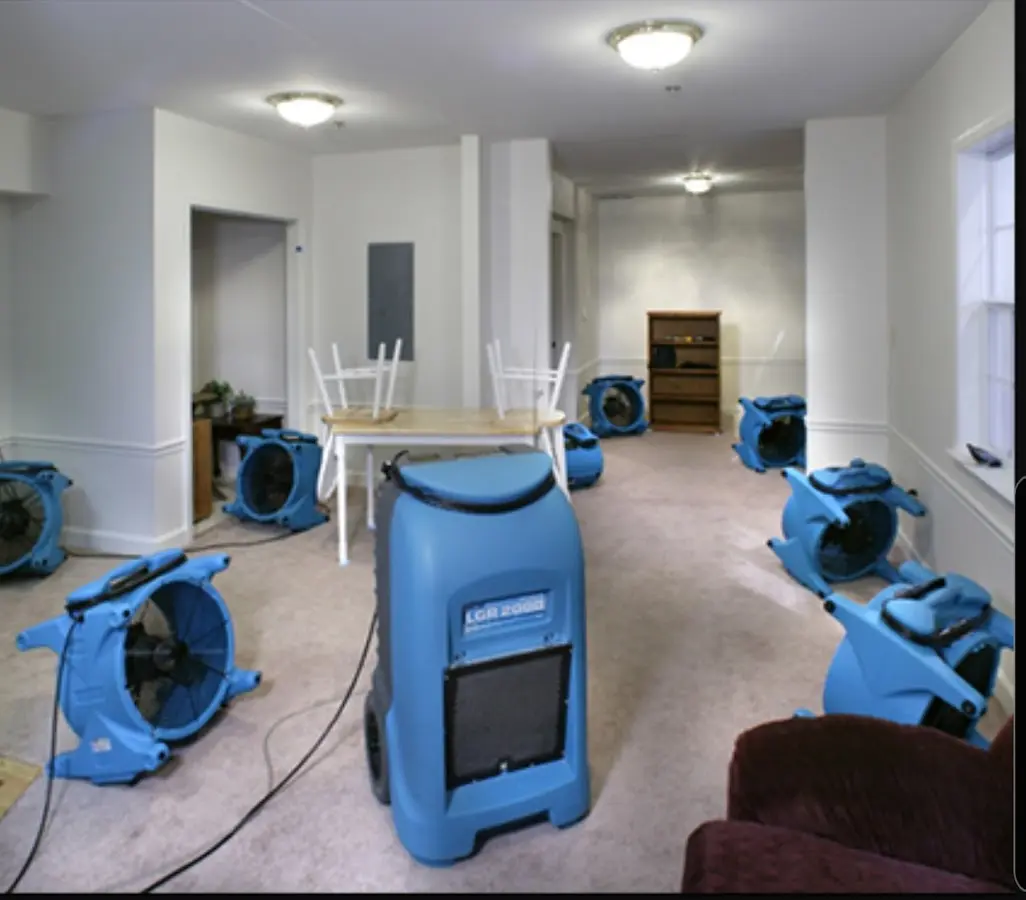 Air movers and dehumidifier setup for Water Extraction & Removal in Atkinson