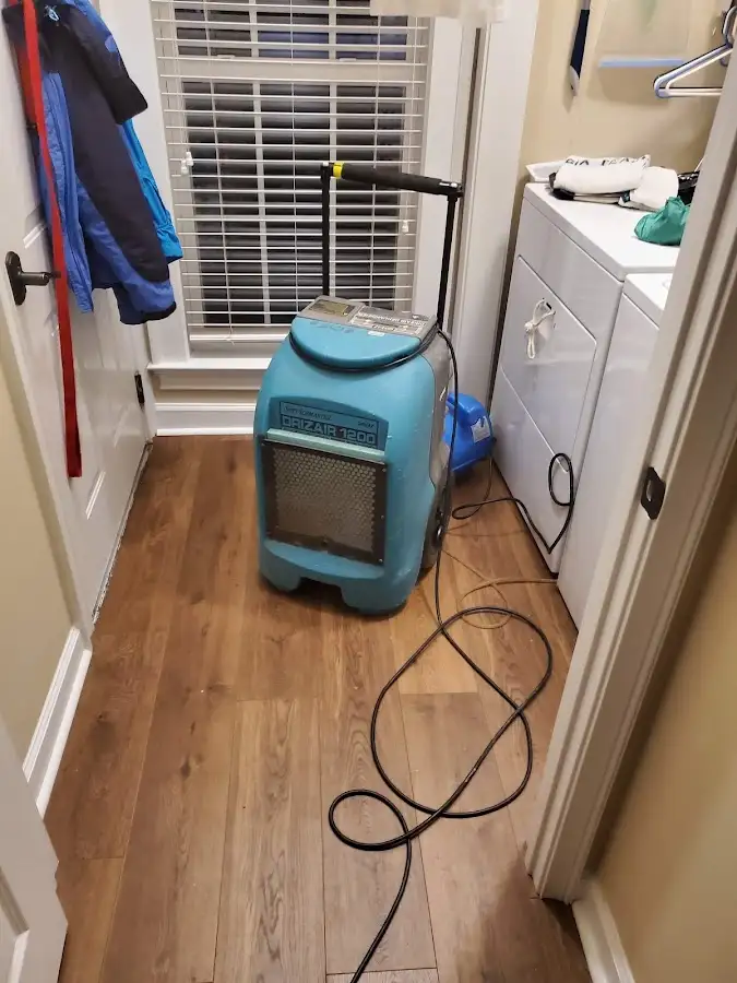 Commercial dehumidifier deployed for Flood Damage Cleanup in Atkinson